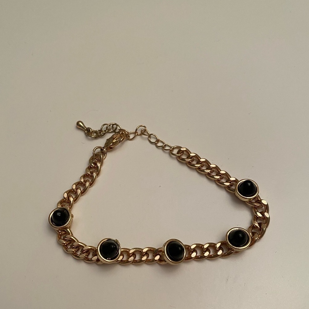 Gold and black spike bracelet